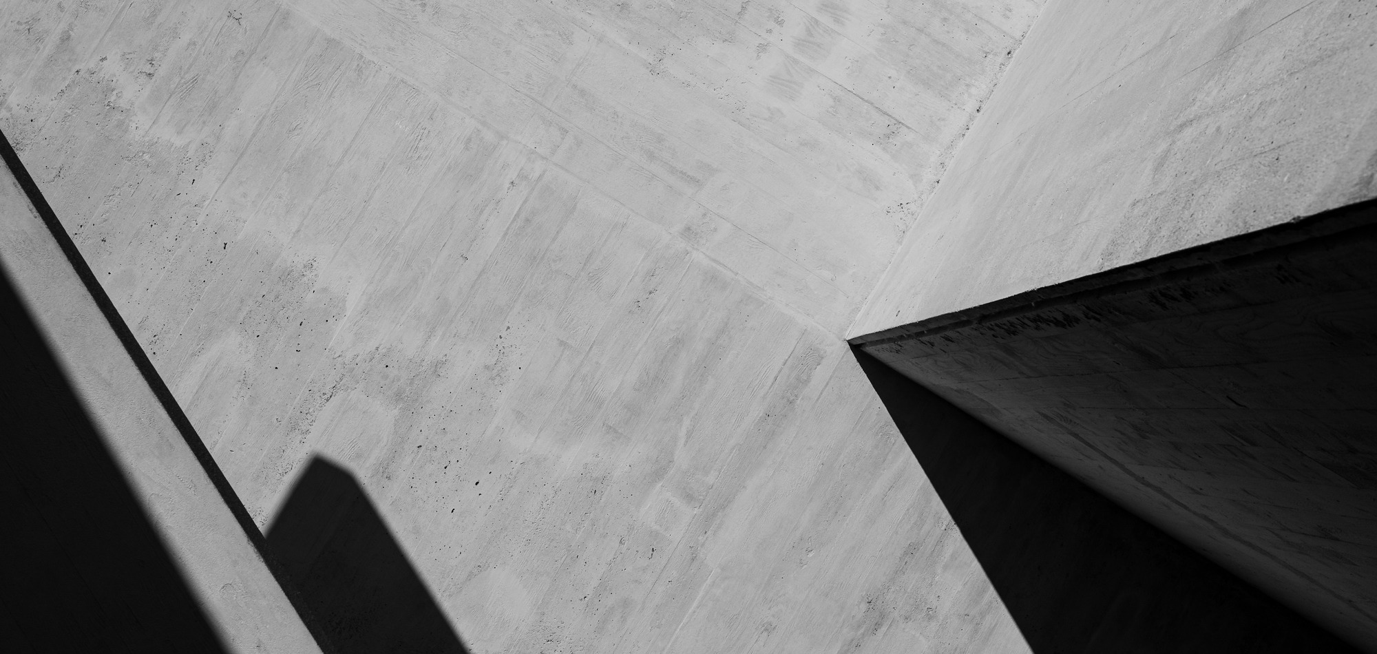 Concrete architectural planes and recessed windows
